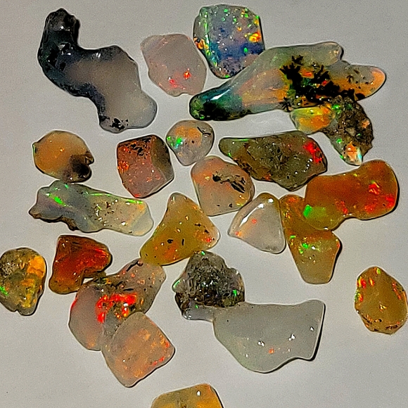 14ctw Natural Black/Blue Ethiopian Opal Polished Rough 4-9mm Grade A 15-30pcs. - Picture 3 of 3
